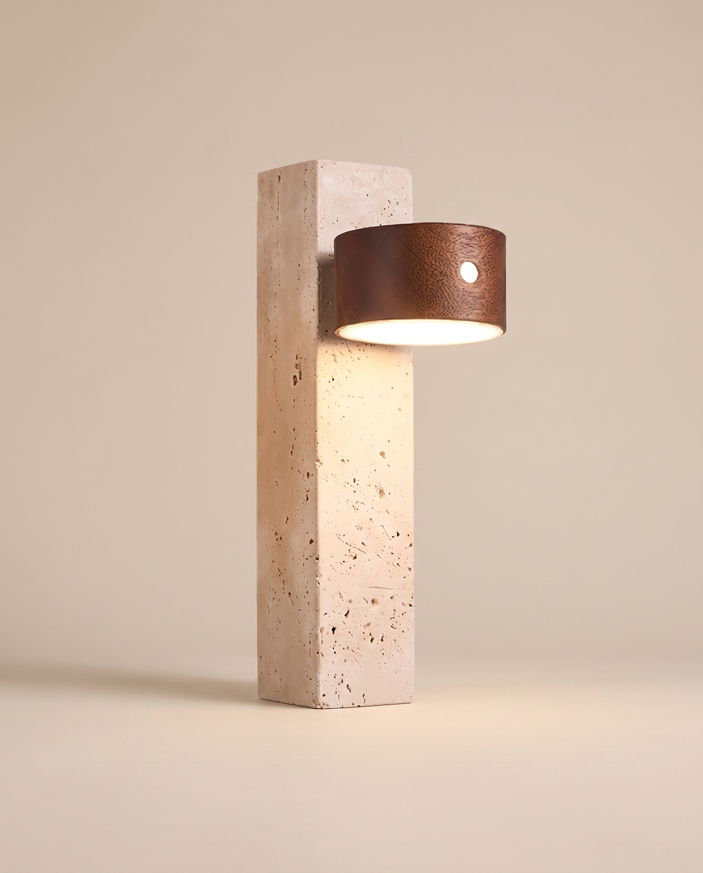 Monolith travertine wall light in Dark Brown walnut, front view