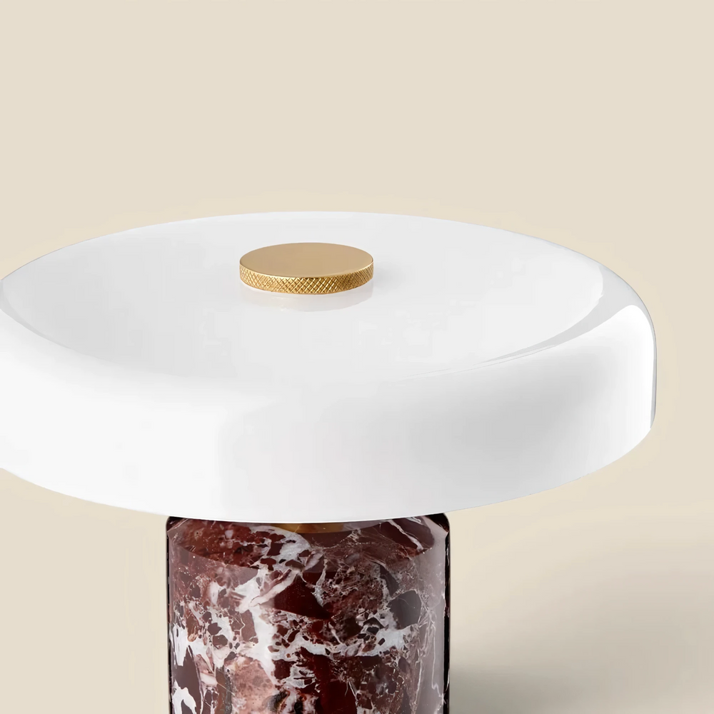 Close-up of the Halo burgundy marble lamp with white opal shade and brass dimmer dial, HALO-BURG-01
