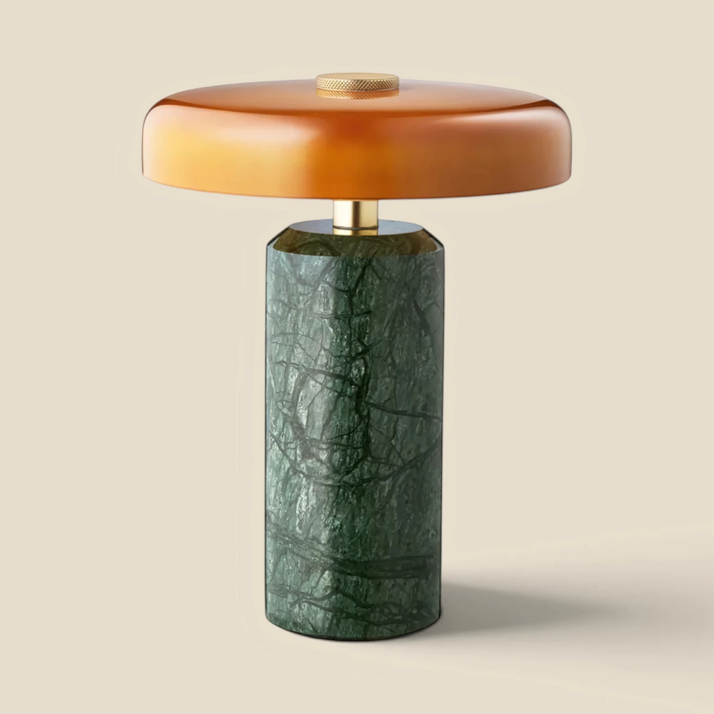 Halo cordless table lamp in green marble with an amber glass shade