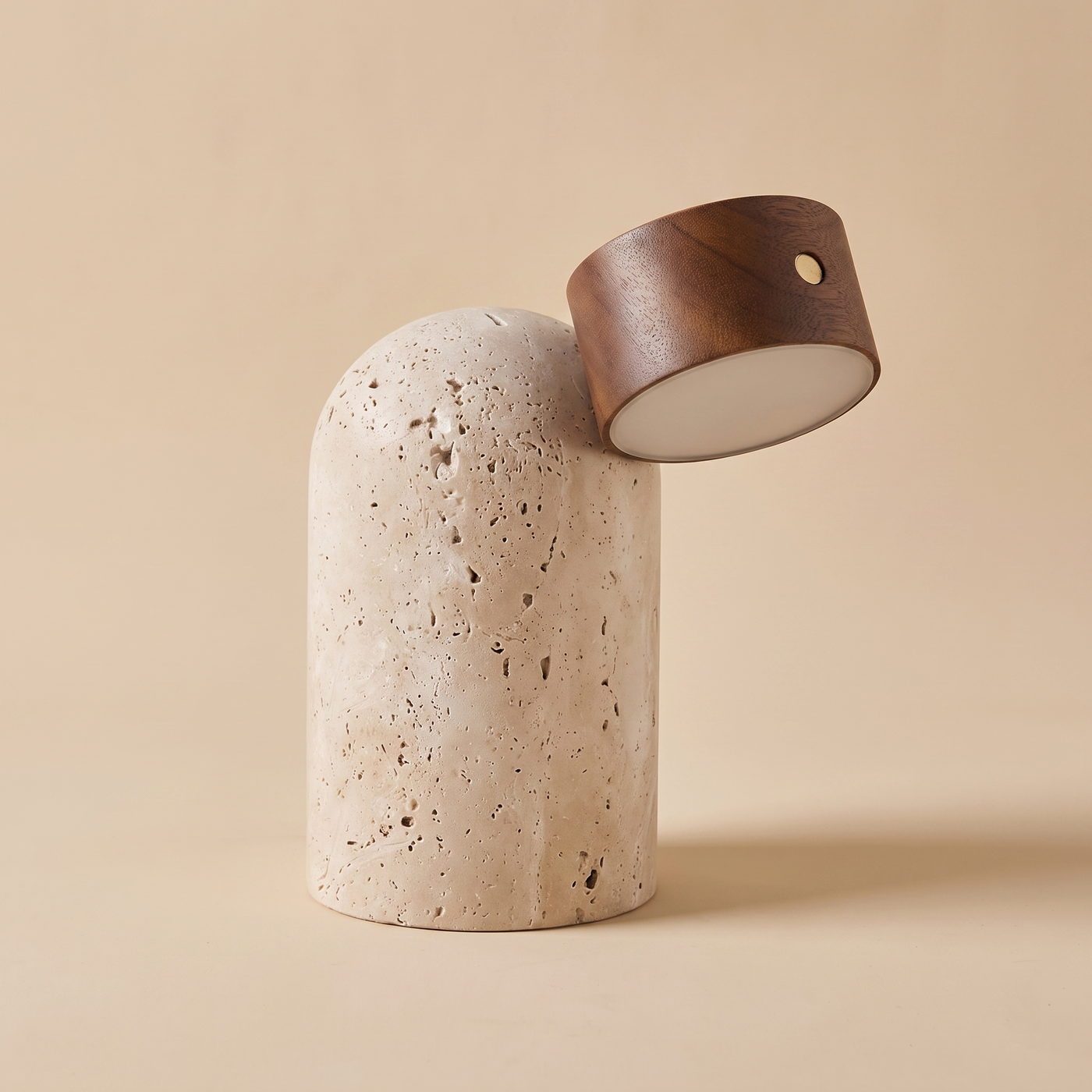 Sten travertine table lamp in Dark Brown walnut, angled view